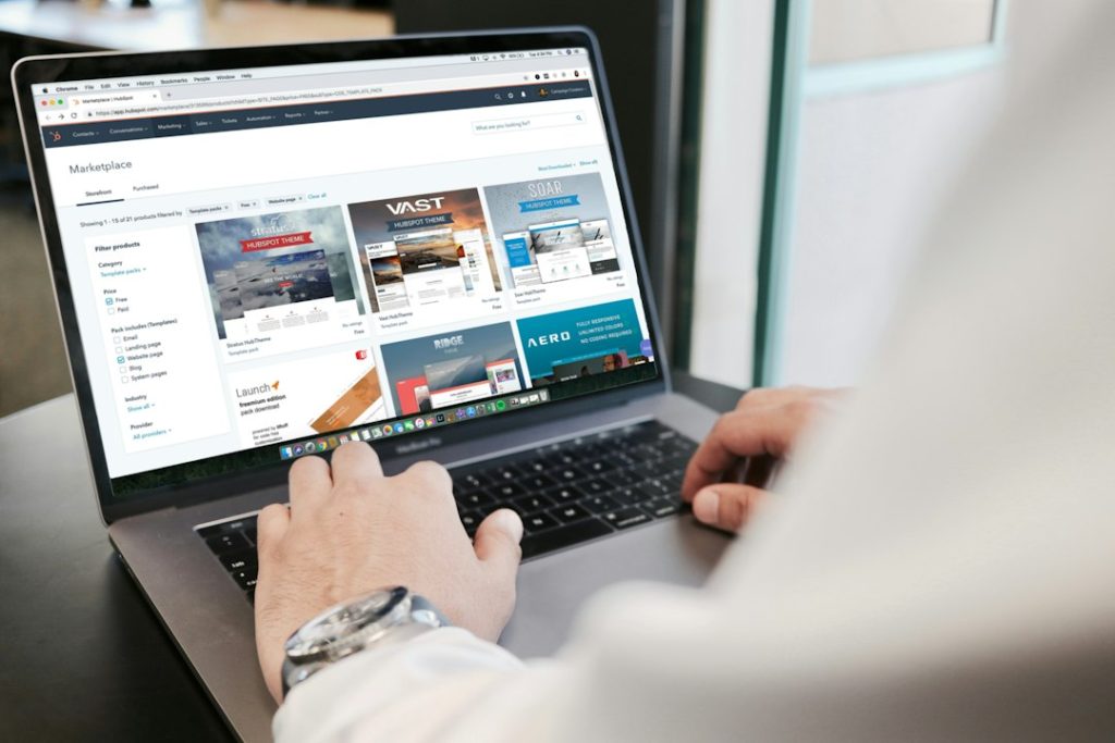 Person working on a laptop building a business website