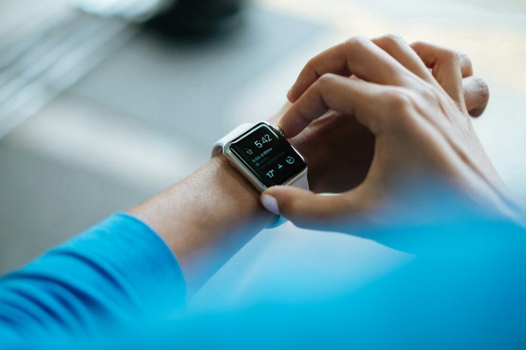 Smartwatch on wrist tracking fitness and sports performance data