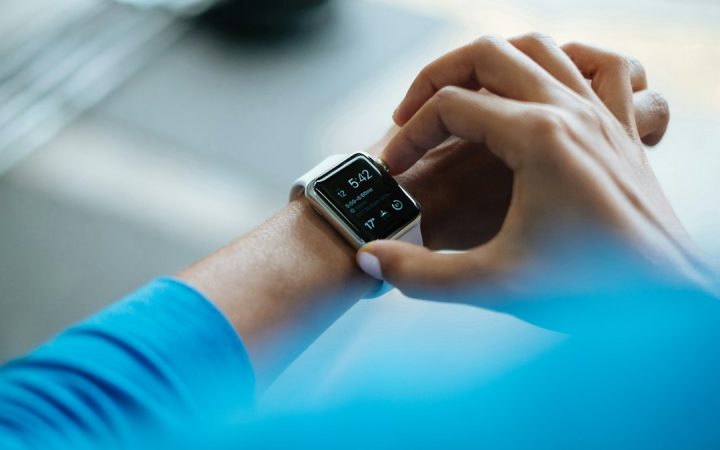 Smartwatch on wrist tracking fitness and sports performance data