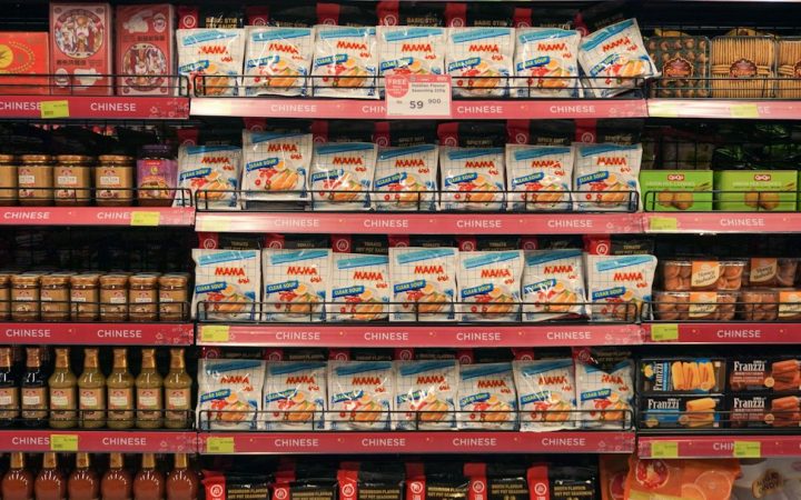 Grocery store aisle with packaged food products on shelves